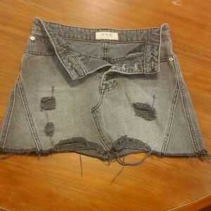 We the free Black distressed denim skirt. Size 24.